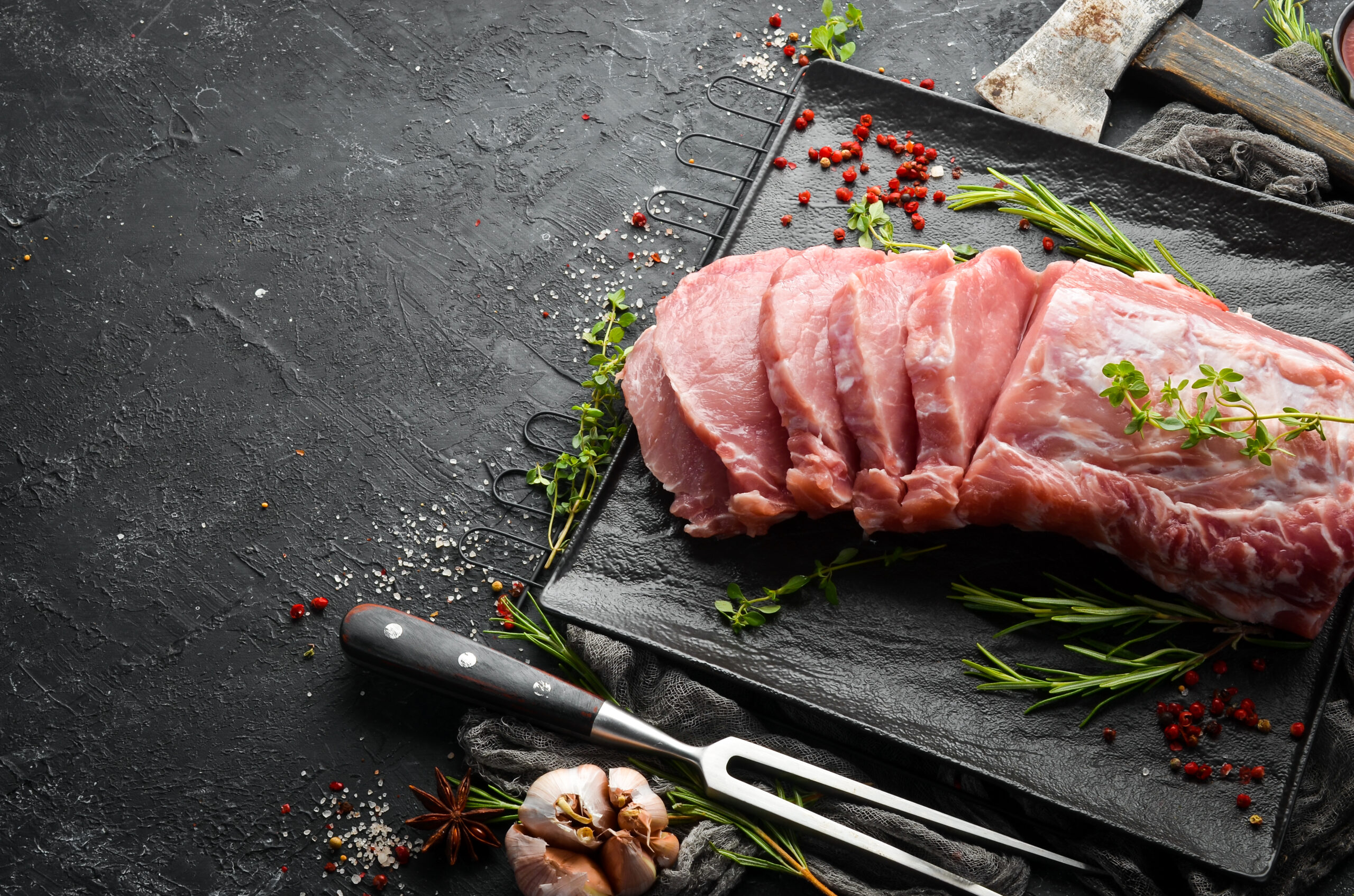 raw-pork-fillet-with-spices-black-stone-background-meat-top-view-rustic-style (1)